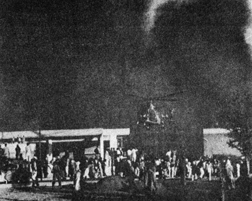 November, 1979: A Pakistan army helicopter hovers over the U.S. embassy, burned by an Islamic fundamentalist mob with the tactic encouragement of Zias government.